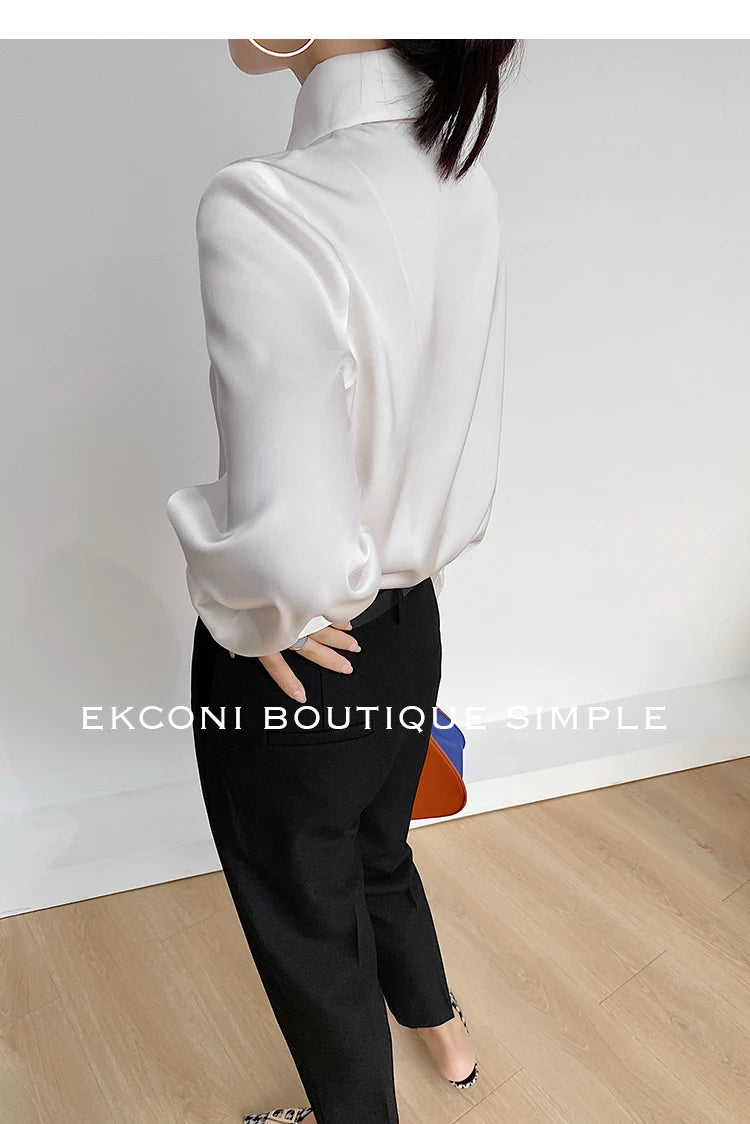 Blusa de mujer elegante de estilo vintage para otoño, ideal para la oficina, con cuello vuelto y mangas largas.