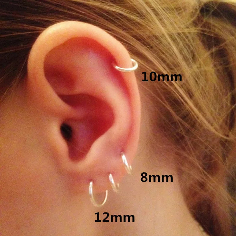 1 par de pendientes de aro pequeños de 2 mm de diámetro, color plata, de acero