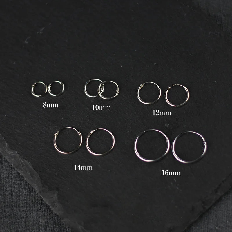 1 par de pendientes de aro pequeños de 2 mm de diámetro, color plata, de acero