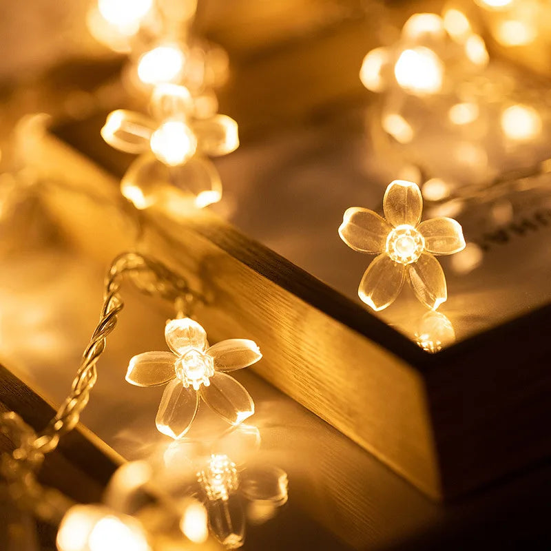 Guirnaldas de luces solares con forma de flores de cerezo para jardín, luces solares impermeables para exteriores, decoración navideña para césped y caminos.