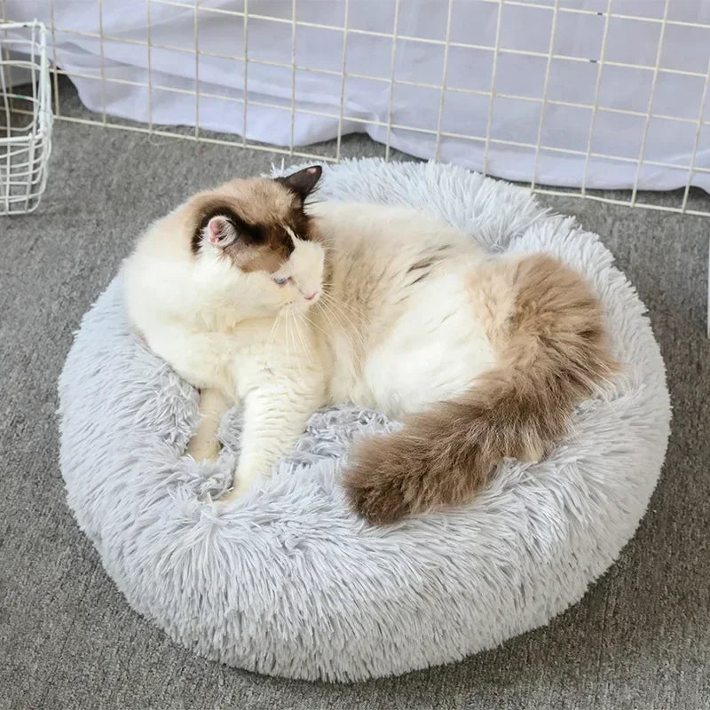 Cama para gatos de pelo largo ultrasuave, de felpa lavable, cama relajante tipo donut, cómoda y funcional.