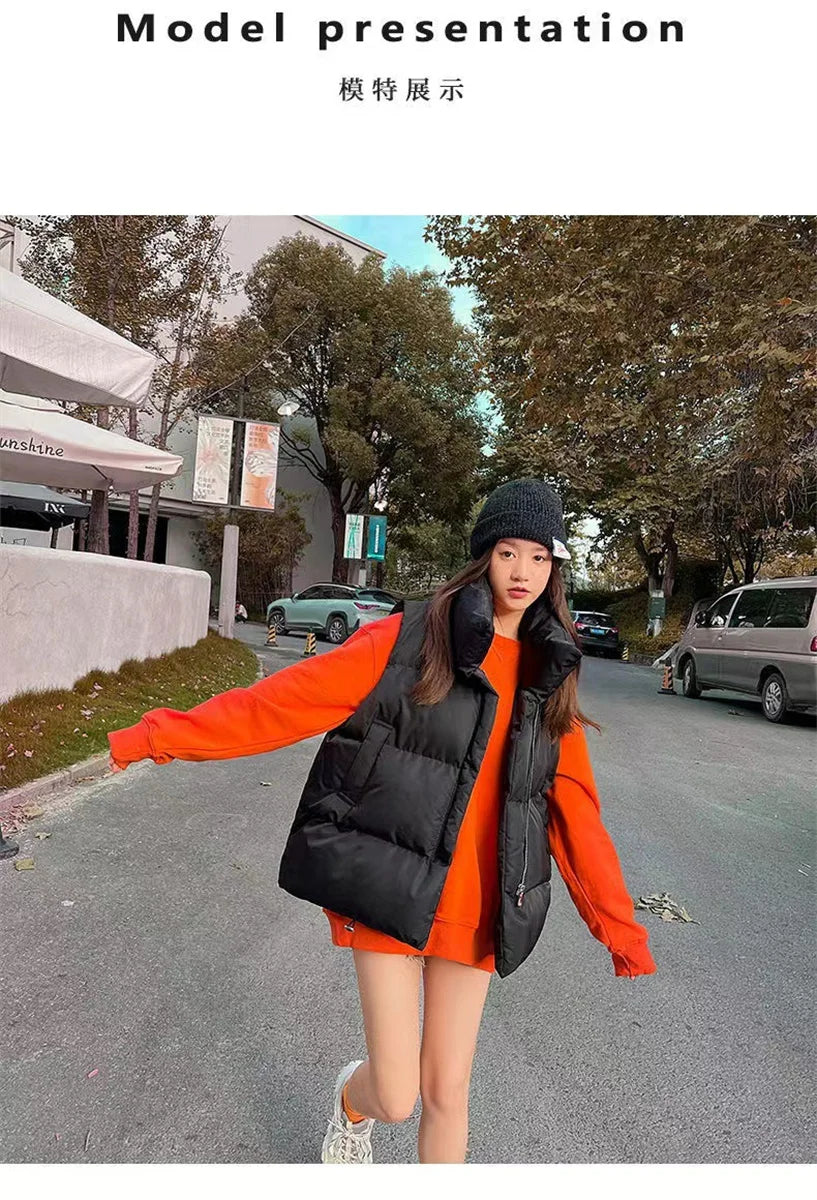 Moda femenina Otoño 2024 Nuevos abrigos de plumas elegantes con cuello alto Prendas de abrigo cálidas Ropa informal Cinturón Sin mangas Chalecos Chaquetas de invierno para mujer