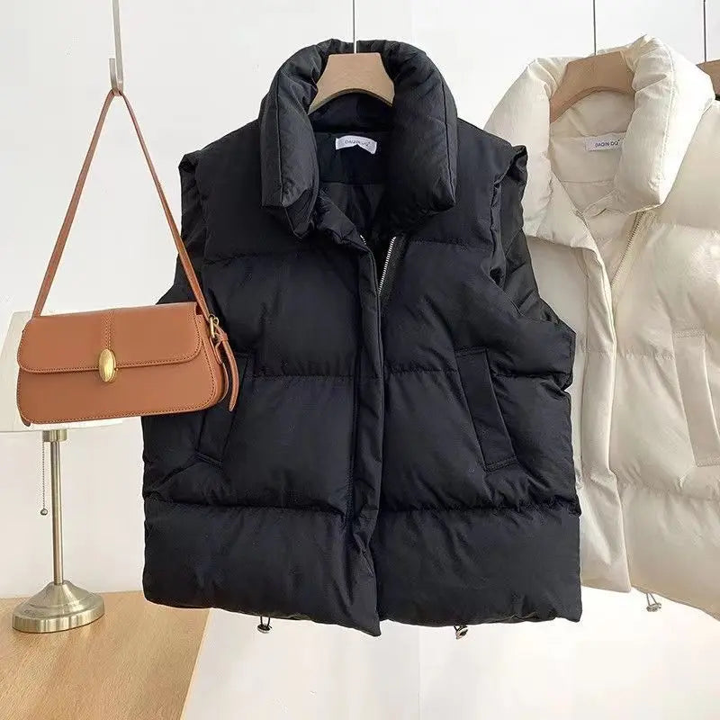 Moda femenina Otoño 2024 Nuevos abrigos de plumas elegantes con cuello alto Prendas de abrigo cálidas Ropa informal Cinturón Sin mangas Chalecos Chaquetas de invierno para mujer