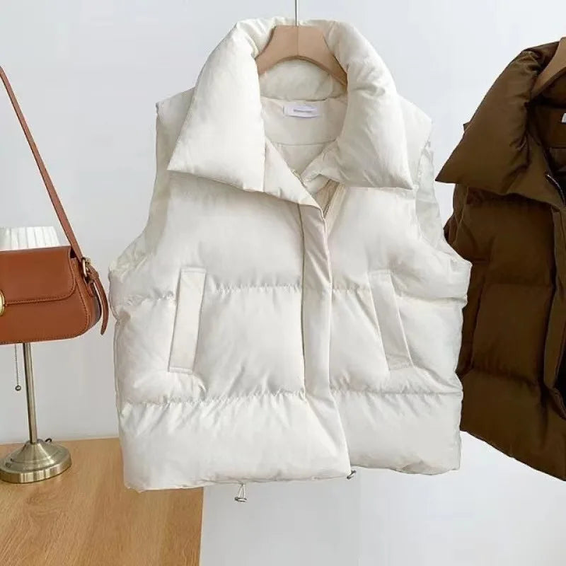 Moda femenina Otoño 2024 Nuevos abrigos de plumas elegantes con cuello alto Prendas de abrigo cálidas Ropa informal Cinturón Sin mangas Chalecos Chaquetas de invierno para mujer
