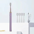 Cepillo de dientes eléctrico con cuerpo de metal fino.