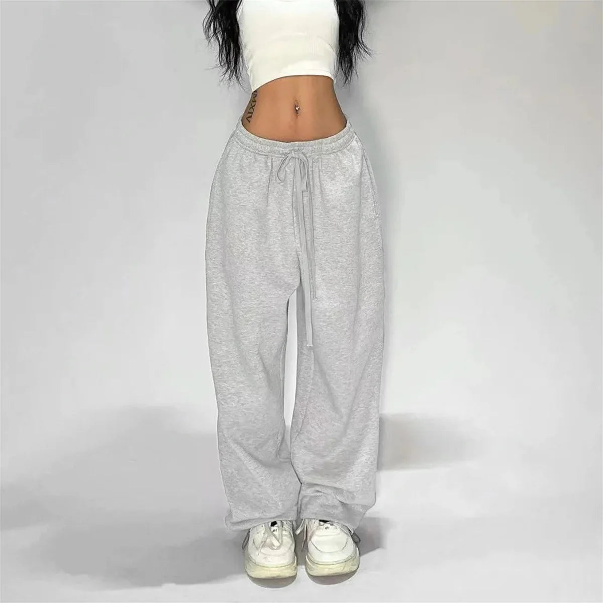 Pantalones retro americanos de moda femenina para otoño y primavera, nuevos en la colección de pantalones anchos a rayas, pantalones deportivos holgados y rectos, estilo casual urbano.