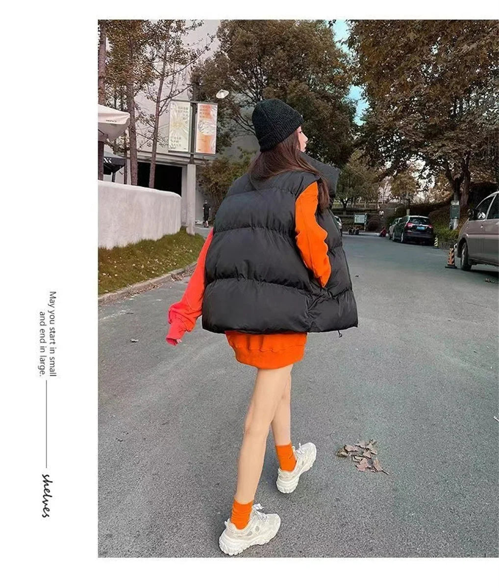 Moda femenina Otoño 2024 Nuevos abrigos de plumas elegantes con cuello alto Prendas de abrigo cálidas Ropa informal Cinturón Sin mangas Chalecos Chaquetas de invierno para mujer